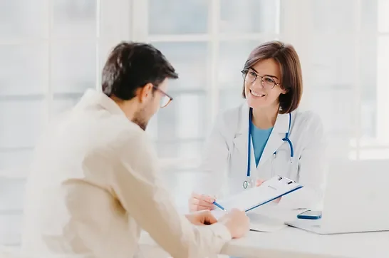 Young doctor talking to patient about medical weight loss