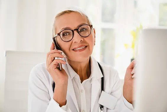 doctor-on-phone Doctor speaking on the phone about weight loss